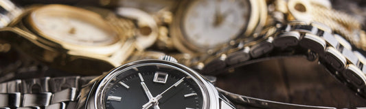 What are the various grades of metal used in a watch chain?