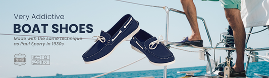 Man wearing navy blue genuine leather boat shoes on a boat at sea — TZARO