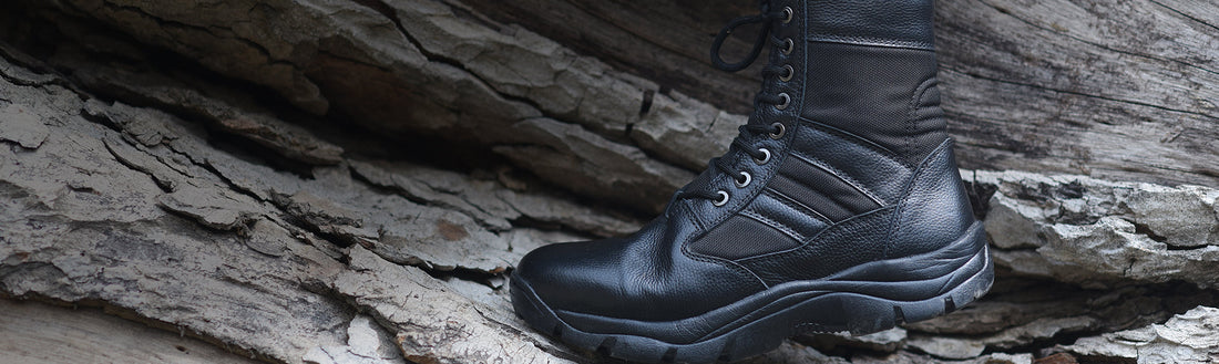 Black leather high-ankle tactical army boot on rocky terrain rugged grip rubber sole – TZARO HULK