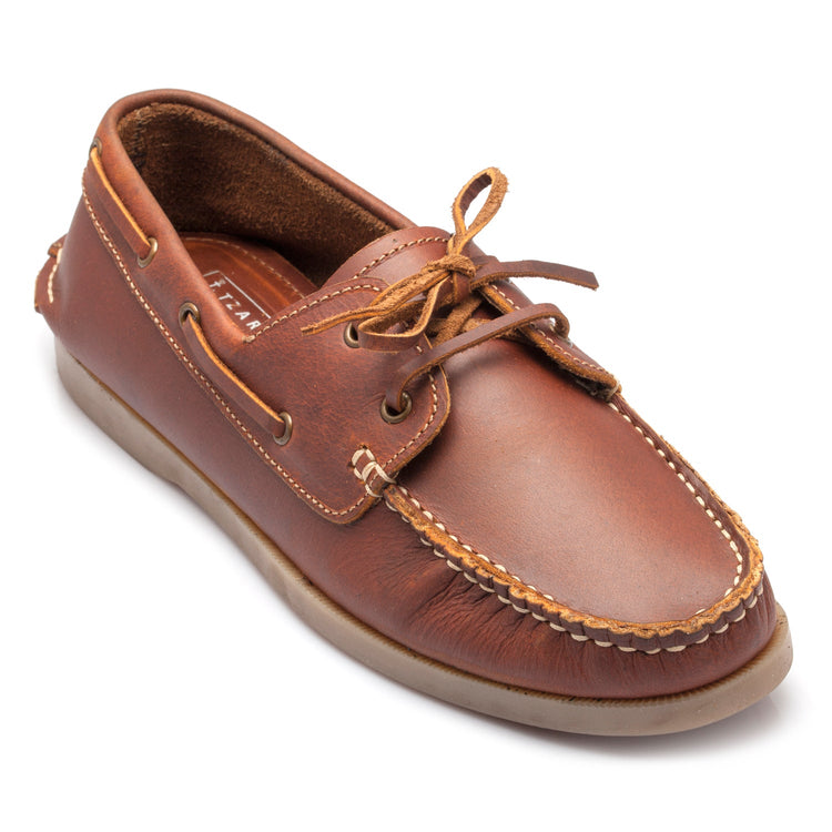 Tan full grain leather boat shoe two-eyelet lacing hand-stitched moccasin construction gum sole front angle – TZARO